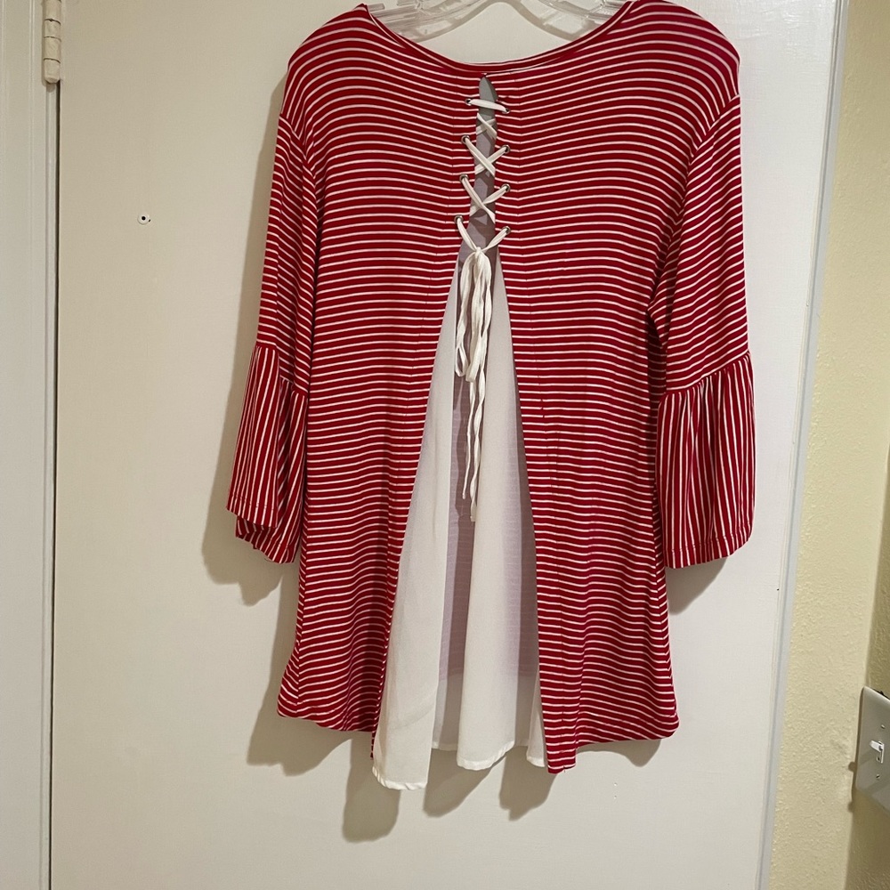 Ladies size large adorable Red striped shirt, with a super cute lace up back.